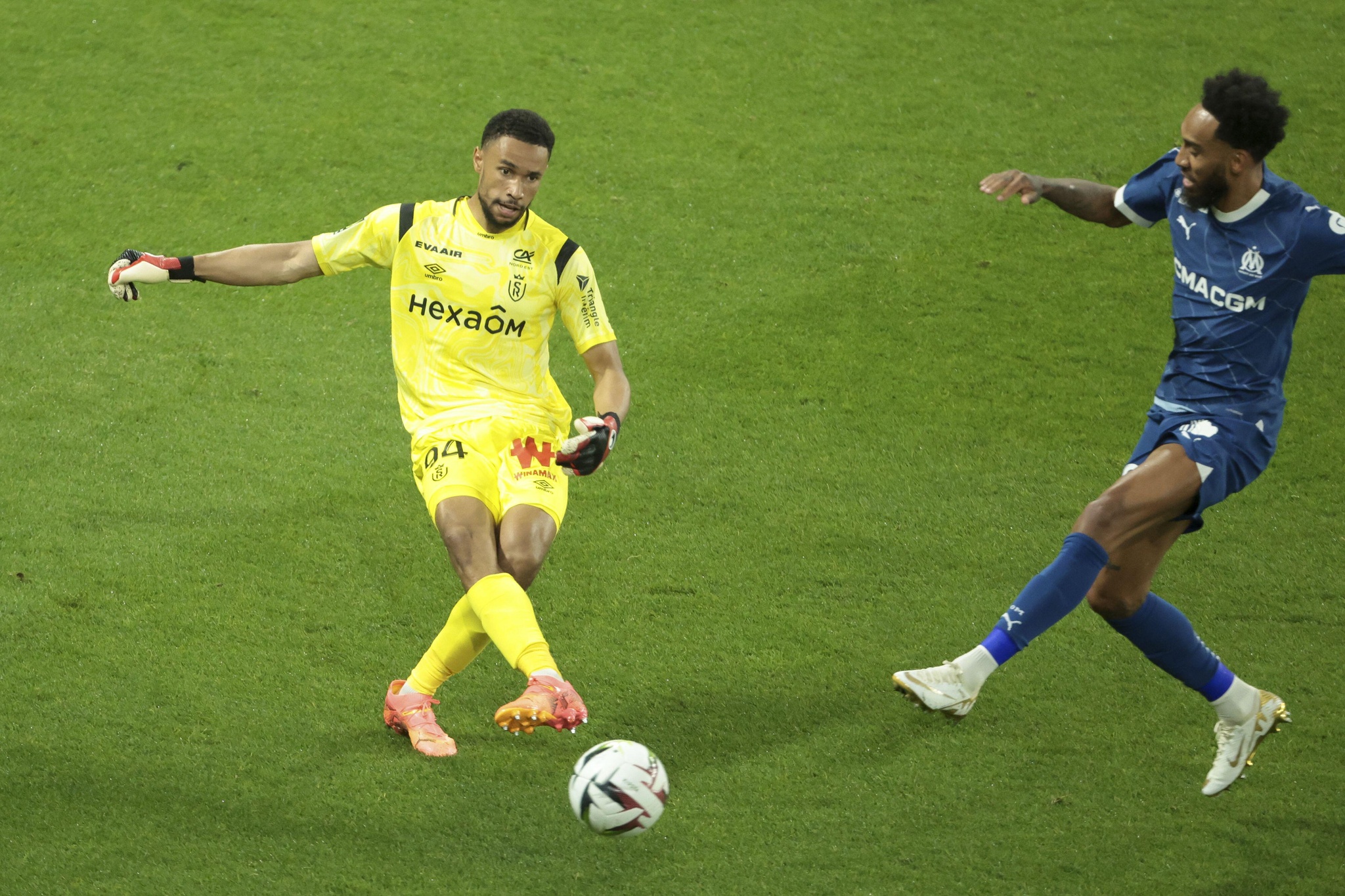 Reims, France, 15/05/2024, Reims goalkeeper Yehvann Diouf, Pierre-Emerick Aubameyang of Marseille during the French championship Ligue 1 football match between Stade de Reims and Olympique de Marseille (OM) on May 15, 2024 at Stade Auguste Delaune in Reims, France
