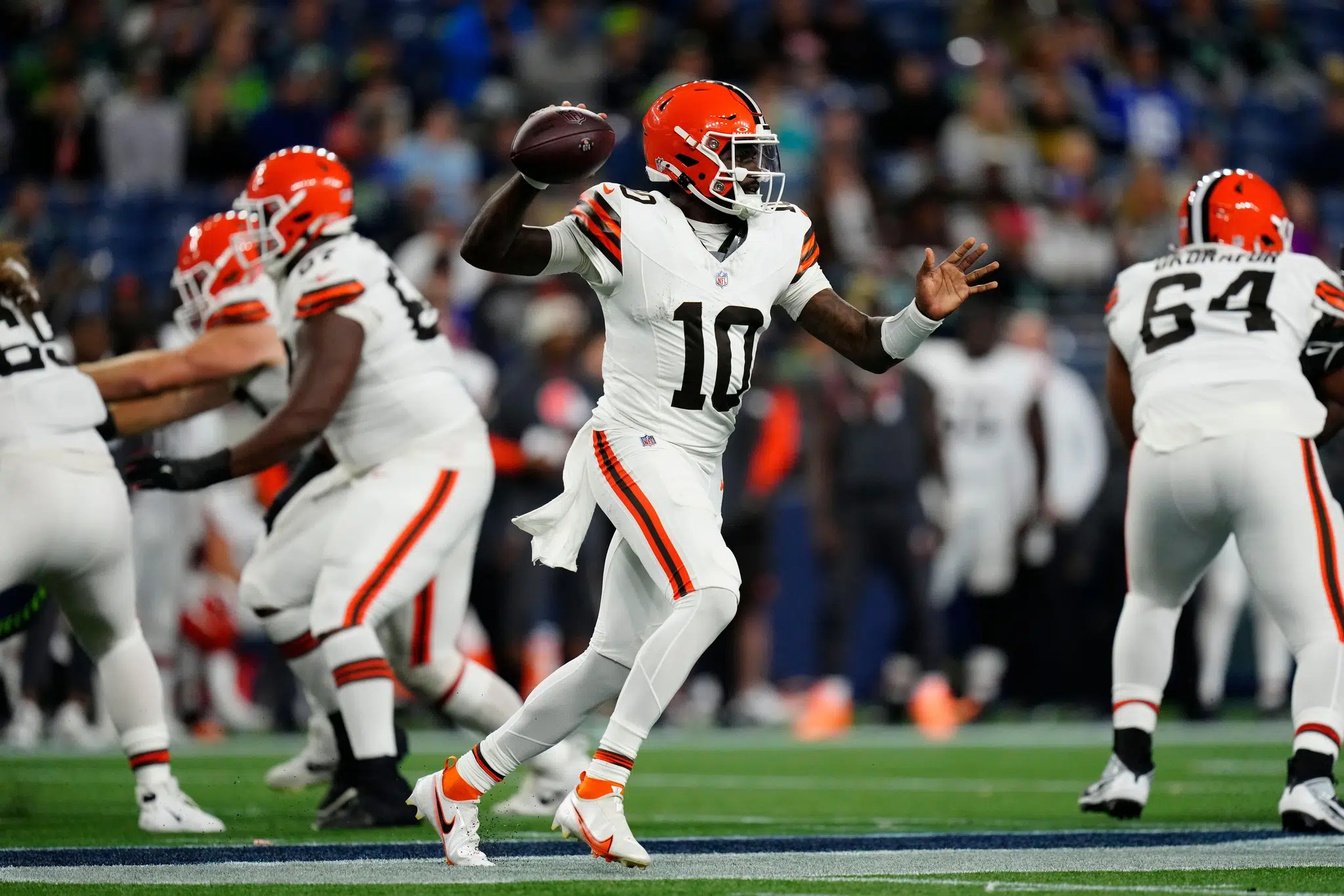 Cleveland Browns quarterback Tyler Huntley (10) passes the ball during an NFL pre-season football game against the Seattle Seahawks, Saturday, Aug. 24, 2024 in Seattle. (AP Photo/Ben VanHouten)
