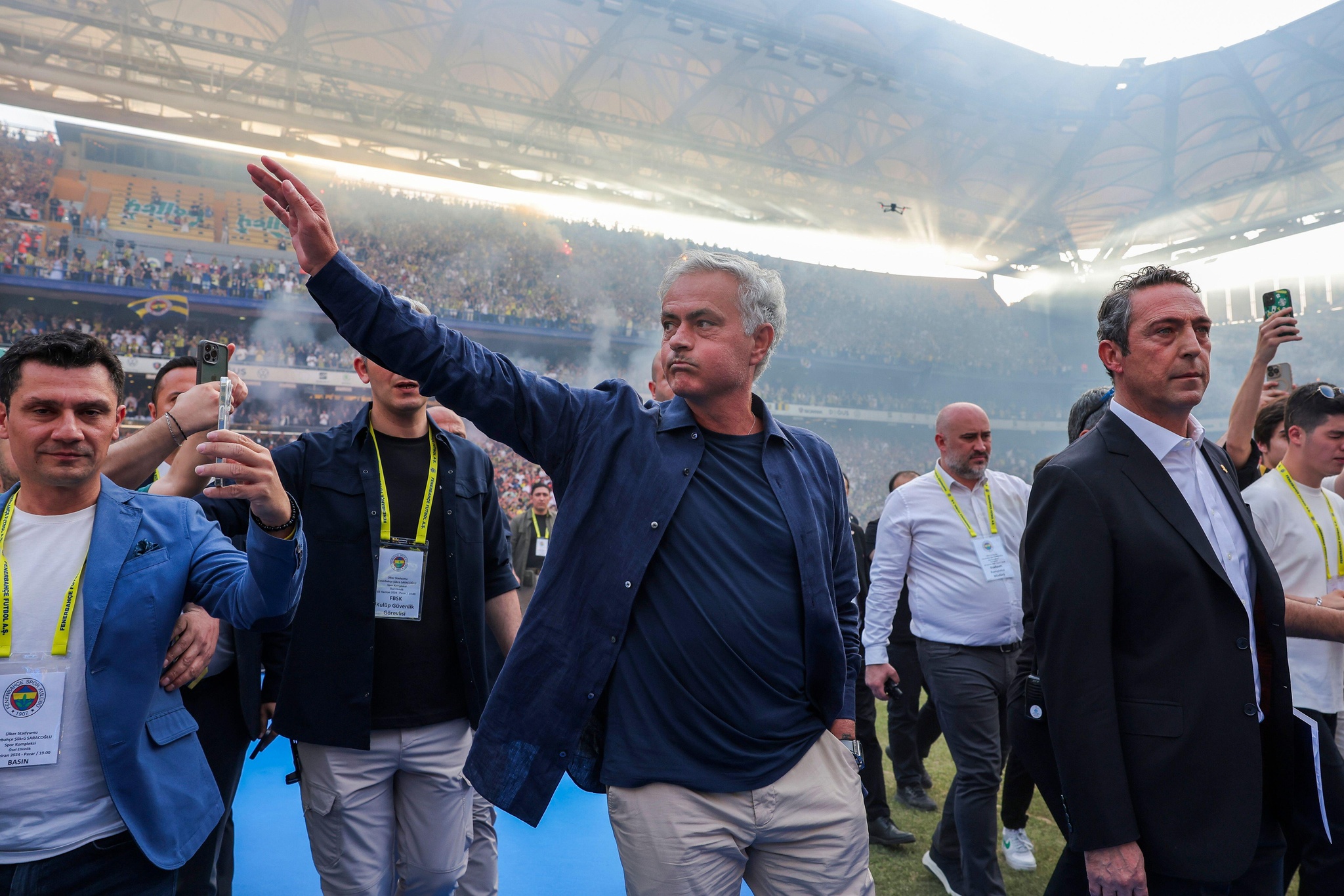 Portuguese soccer coach Jose Mourinho gestures to supporters during his official presentation as Turkish's Fenerbahce new coach at Sukru Saracoglu stadium in Istanbul, Turkey, Sunday, June 2, 2024. Mourinho has signed a two-year contract with Fenerbahce. (AP Photo)