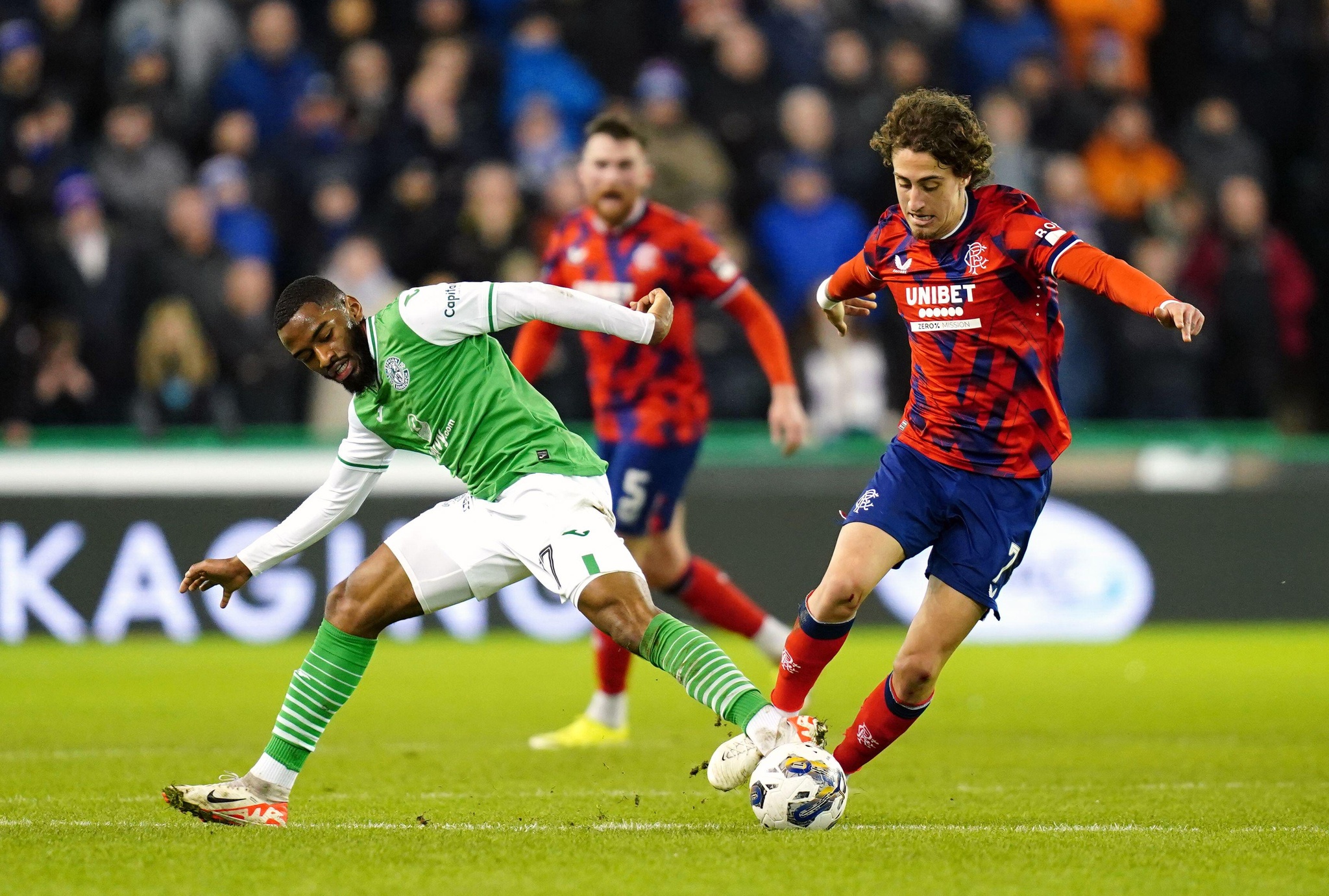 Hibernian's Myziane Maolida (left) and Rangers' Fabio Silva battle for the ball during the cinch Premiership match at Easter Road, Edinburgh. Picture date: Wednesday January 24, 2024.