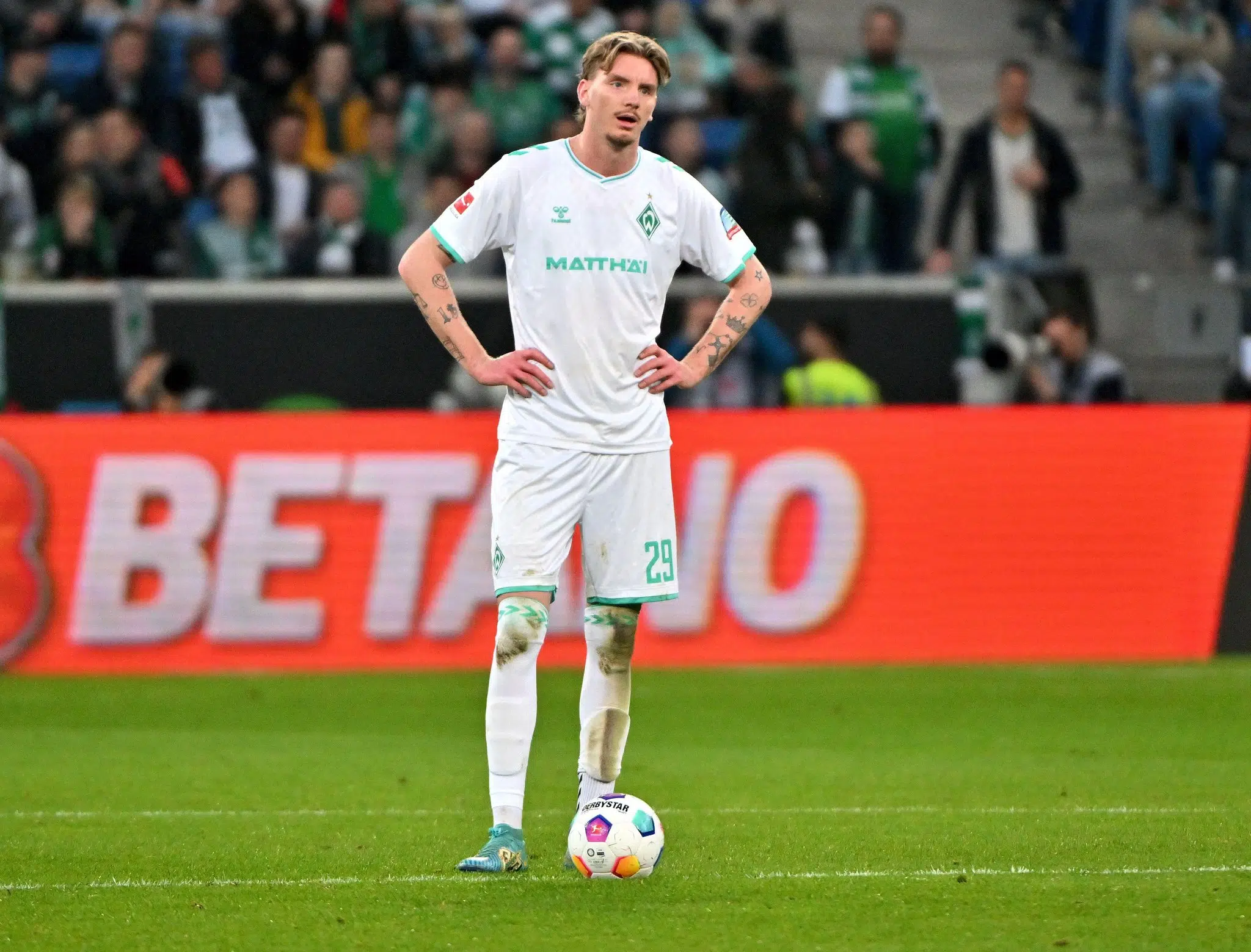 Sinsheim, Germany. 03rd Mar, 2024. Soccer: Bundesliga, TSG 1899 Hoffenheim - Werder Bremen, Matchday 24, PreZero Arena. Nick Woltemade of Werder Bremen stands at the center circle. Credit: Jan-Philipp Strobel/dpa - IMPORTANT NOTE: In accordance with the regulations of the DFL German Football League and the DFB German Football Association, it is prohibited to utilize or have utilized photographs taken in the stadium and/or of the match in the form of sequential images and/or video-like photo series./dpa/Alamy Live News