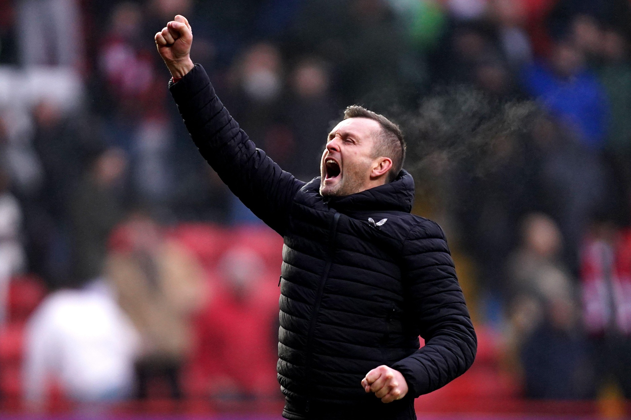 Charlton's manager Nathan Jones celebrates after the Sky Bet League One match at The Valley, London. Picture date: Saturday February 8, 2025.