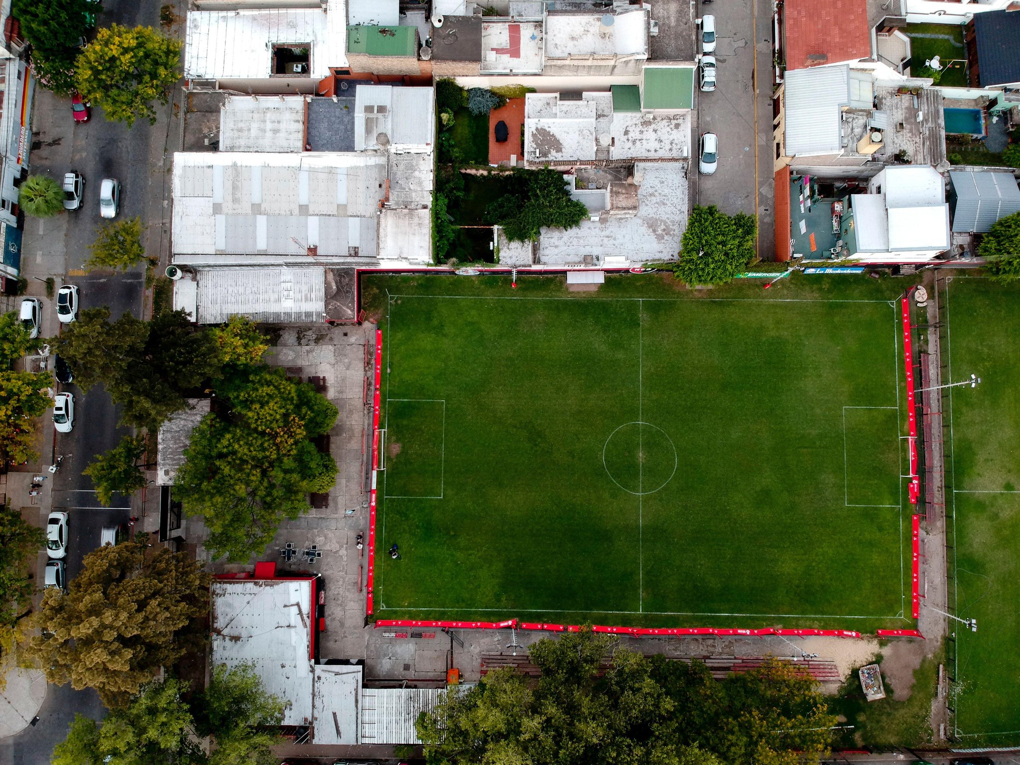 This April 17, 2018 photo shows a soccer field used by the Newell's Old Boys youth teams in Rosario, Argentina, the city where soccer great Lionel Messi grew up. "You breathe football everywhere in Rosario, but, curiously, the air doesn't smell of Messi. There are hardly any photos, or pictures, nor even advertisements depicting Leo," author Guillem Balague writes in "Messi," the official biography. (AP Photo/Natacha Pisarenko)