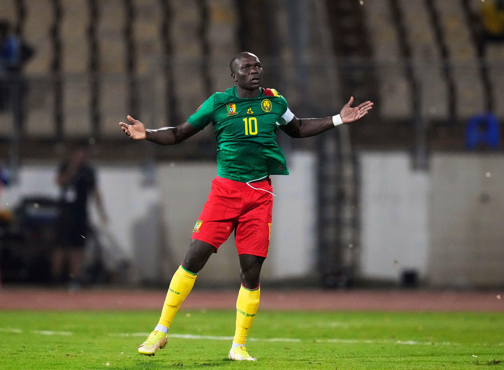 Cameroon's Vincent Aboubakar celebrates after scoring his penalty kick against Burkina Faso goalkeeper Aboubacar Sawadogo during the African Cup of Nations third place soccer match between Burkina Faso and Cameroon at the Ahmadou Ahidjo stadium in Yaounde, Cameroon, Saturday, Feb. 5, 2022. (AP Photo/Themba Hadebe)