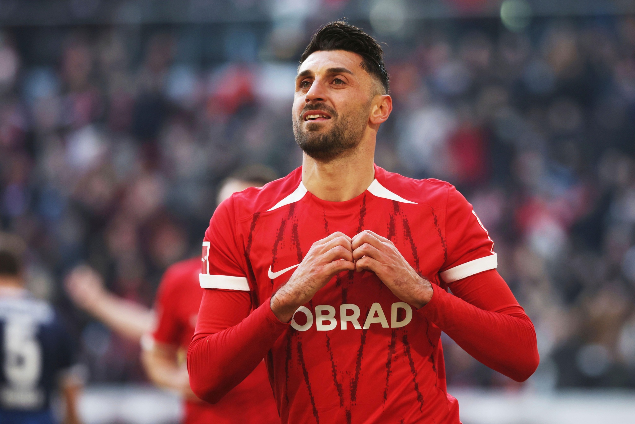 Freiburg's Vincenzo Grifo celebrates his opening goal during the German Bundesliga soccer match between Freiburg and Heidenheim at The Europa-Park Stadion in Freiburg, Germany, Saturday, Feb. 8, 2025 (Philipp von Ditfurth/dpa via AP)