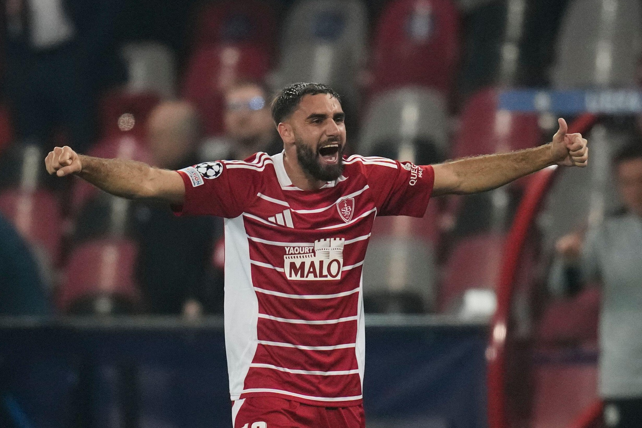 Brest's Romain Del Castillo celebrates after the Champions League opening phase soccer match between Brest and Sturm Graz in Guingamp, western France, Thursday, Sept. 19, 2024. (AP Photo/Christophe Ena)