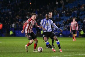 Dan Neil’s Future in Limbo as Championship Giants Eye Midfield Maestro