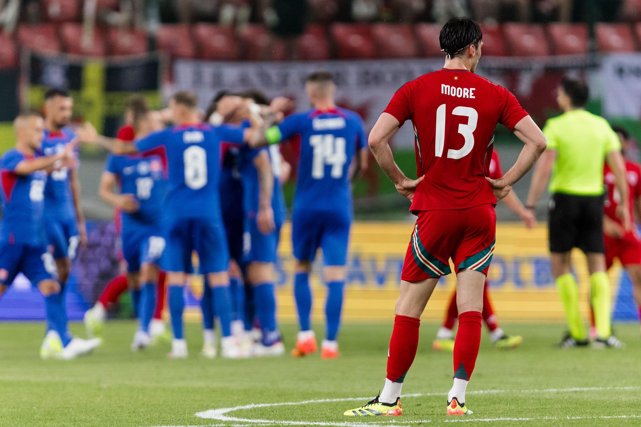 BRATISLAVA, SLOVAKIA - 09 JUNE 2024: Wales' Kieffer Moore as Slovakia's Juraj Kucka celebrates a goal during the international friendly match between Slovakia & Cymru at the Stadium of Anton Malatinský, Slovakia, on the 9th June. (Pic by John Smith/FAW) Credit: Football Association of Wales/Alamy Live News