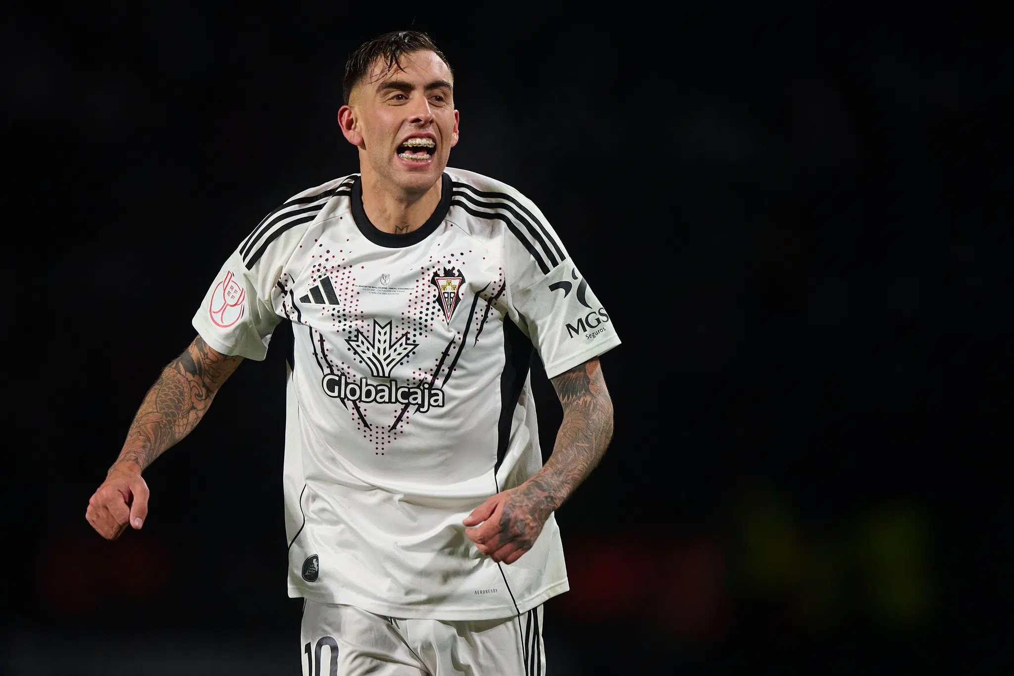 (260115) -- ALBACETE, Jan. 15, 2026 (Xinhua) -- Jefte Betancor of Albacete celebrates a goal during the Copa del Rey round of 16 football match between Albacete and Real Madrid in Albacete, Spain, Jan. 14, 2026. (Stringer/Xinhua)